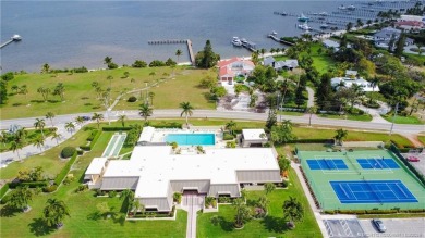 Enjoy first floor living with fantastic views from every room on Martin County Golf Course in Florida - for sale on GolfHomes.com, golf home, golf lot