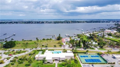 Enjoy first floor living with fantastic views from every room on Martin County Golf Course in Florida - for sale on GolfHomes.com, golf home, golf lot