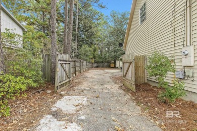 INVESTOR SPECIAL! This delightful Creole-style residence offers on Lake Forest Yacht and Country Club in Alabama - for sale on GolfHomes.com, golf home, golf lot