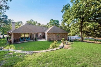 Little slice of paradise! Welcome to 1125 Kiowa Dr. E, located on Lake Kiowa Golf Course in Texas - for sale on GolfHomes.com, golf home, golf lot