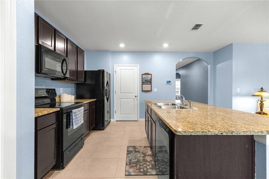 Welcome to this beautifully maintained 3-bedroom, 2-bath home on Lake Diamond Golf and Country Club in Florida - for sale on GolfHomes.com, golf home, golf lot