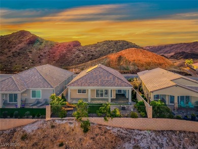 Perched along the side of a dramatic cliff with no rear on Reflection Bay Golf Club in Nevada - for sale on GolfHomes.com, golf home, golf lot
