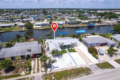 Under contract-accepting backup offers. Welcome to paradise with on Port Charlotte Golf Club in Florida - for sale on GolfHomes.com, golf home, golf lot