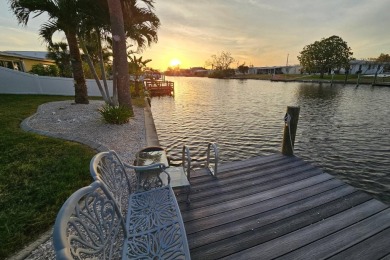 Under contract-accepting backup offers. Welcome to paradise with on Port Charlotte Golf Club in Florida - for sale on GolfHomes.com, golf home, golf lot
