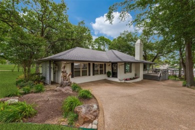 WOW! Lakefront oasis that has been remodeled from the studs up! on Star Harbor Golf Club in Texas - for sale on GolfHomes.com, golf home, golf lot
