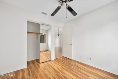 This inviting 3-bedroom, 2-bathroom corner lot home with a on The Club At Pelican Bay - North Course in Florida - for sale on GolfHomes.com, golf home, golf lot