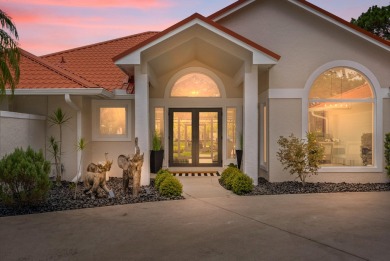 This 3BD, 2.5BA CBS pool home in Palm City is anything but on Evergreen Club in Florida - for sale on GolfHomes.com, golf home, golf lot