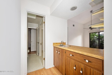 This inviting 3-bedroom, 2-bathroom corner lot home with a on The Club At Pelican Bay - North Course in Florida - for sale on GolfHomes.com, golf home, golf lot