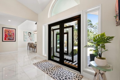 This 3BD, 2.5BA CBS pool home in Palm City is anything but on Evergreen Club in Florida - for sale on GolfHomes.com, golf home, golf lot