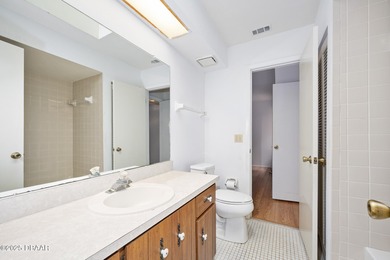 This inviting 3-bedroom, 2-bathroom corner lot home with a on The Club At Pelican Bay - North Course in Florida - for sale on GolfHomes.com, golf home, golf lot