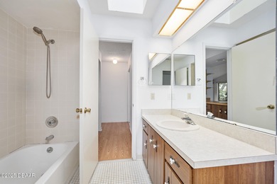 This inviting 3-bedroom, 2-bathroom corner lot home with a on The Club At Pelican Bay - North Course in Florida - for sale on GolfHomes.com, golf home, golf lot