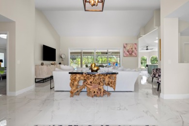 This 3BD, 2.5BA CBS pool home in Palm City is anything but on Evergreen Club in Florida - for sale on GolfHomes.com, golf home, golf lot