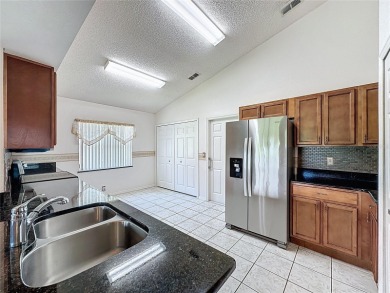 Popular Canterbury model with a private back located in 55+ on Kings Ridge Golf Club in Florida - for sale on GolfHomes.com, golf home, golf lot