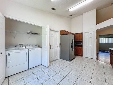 Popular Canterbury model with a private back located in 55+ on Kings Ridge Golf Club in Florida - for sale on GolfHomes.com, golf home, golf lot