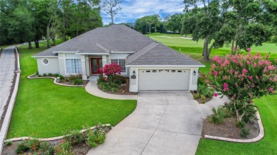 Welcome home to this 4 Bedroom 2 bath Block Stucco Golf Course on Harbor Hills Country Club in Florida - for sale on GolfHomes.com, golf home, golf lot