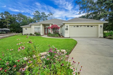 Welcome home to this 4 Bedroom 2 bath Block Stucco Golf Course on Harbor Hills Country Club in Florida - for sale on GolfHomes.com, golf home, golf lot