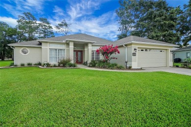 Welcome home to this 4 Bedroom 2 bath Block Stucco Golf Course on Harbor Hills Country Club in Florida - for sale on GolfHomes.com, golf home, golf lot