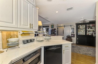 Attractive three bedroom, two bath condo with a two car garage on Capri Isle Golf Club in Florida - for sale on GolfHomes.com, golf home, golf lot