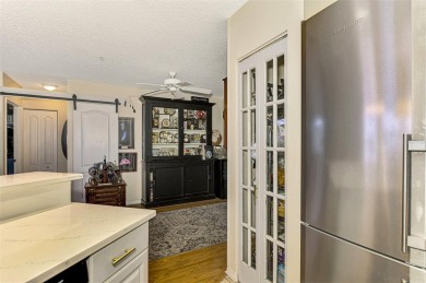 Attractive three bedroom, two bath condo with a two car garage on Capri Isle Golf Club in Florida - for sale on GolfHomes.com, golf home, golf lot