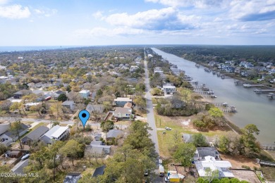 Waterway Views can be yours from this building lot right behind on Founders Club At St. James Plantation in North Carolina - for sale on GolfHomes.com, golf home, golf lot