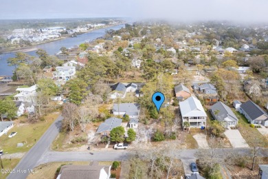 Waterway Views can be yours from this building lot right behind on Founders Club At St. James Plantation in North Carolina - for sale on GolfHomes.com, golf home, golf lot