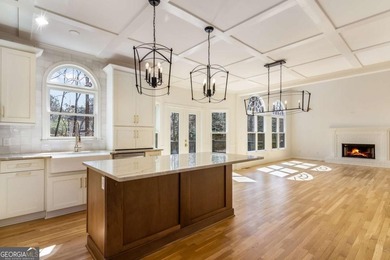 Welcome to this beautifully updated 5-bedroom, 3.5-bath home in on Towne Lake Hills Golf Club in Georgia - for sale on GolfHomes.com, golf home, golf lot