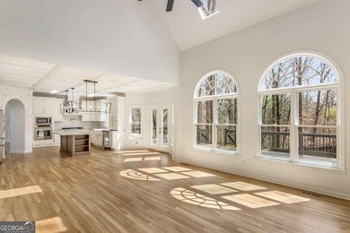 Welcome to this beautifully updated 5-bedroom, 3.5-bath home in on Towne Lake Hills Golf Club in Georgia - for sale on GolfHomes.com, golf home, golf lot