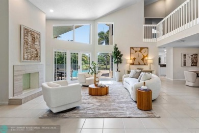 Serene lake views, sunlit living spaces, and a private backyard on Delaire Golf and Country Club in Florida - for sale on GolfHomes.com, golf home, golf lot