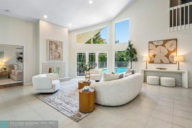 Serene lake views, sunlit living spaces, and a private backyard on Delaire Golf and Country Club in Florida - for sale on GolfHomes.com, golf home, golf lot