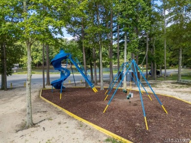 Welcome to your dream getaway on Lake Gaston! Nestled at the end on Tanglewood Shores Golf Club in Virginia - for sale on GolfHomes.com, golf home, golf lot