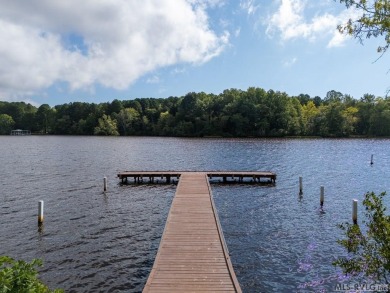 Welcome to your dream getaway on Lake Gaston! Nestled at the end on Tanglewood Shores Golf Club in Virginia - for sale on GolfHomes.com, golf home, golf lot