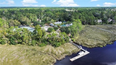 Welcome to this exquisite 5-bedroom, 4.5-bathroom home in the on The Club At Osprey Cove in Georgia - for sale on GolfHomes.com, golf home, golf lot
