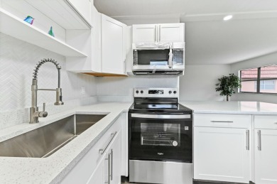 Come visit this beautifully renovated,modern and turn-key condo on Addison Reserve in Florida - for sale on GolfHomes.com, golf home, golf lot
