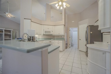 Spacious 3-bedroom, 3-bath home on nearly half an acre with on Silverado Golf and Country Club in Florida - for sale on GolfHomes.com, golf home, golf lot