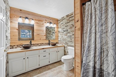 Enjoy peaceful golf course living in this beautiful one-level on Mountain Ranch Golf Club in Arkansas - for sale on GolfHomes.com, golf home, golf lot