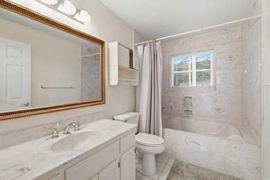 Enjoy peaceful golf course living in this beautiful one-level on Mountain Ranch Golf Club in Arkansas - for sale on GolfHomes.com, golf home, golf lot