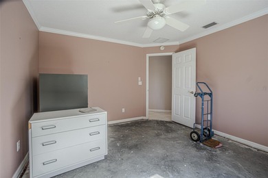 Spacious 3-bedroom, 3-bath home on nearly half an acre with on Silverado Golf and Country Club in Florida - for sale on GolfHomes.com, golf home, golf lot