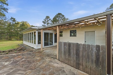 Enjoy peaceful golf course living in this beautiful one-level on Mountain Ranch Golf Club in Arkansas - for sale on GolfHomes.com, golf home, golf lot