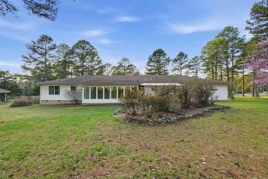 Enjoy peaceful golf course living in this beautiful one-level on Mountain Ranch Golf Club in Arkansas - for sale on GolfHomes.com, golf home, golf lot