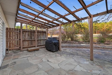 Enjoy peaceful golf course living in this beautiful one-level on Mountain Ranch Golf Club in Arkansas - for sale on GolfHomes.com, golf home, golf lot