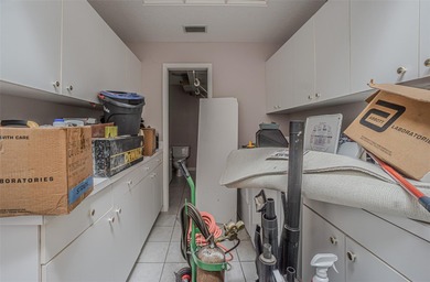 Spacious 3-bedroom, 3-bath home on nearly half an acre with on Silverado Golf and Country Club in Florida - for sale on GolfHomes.com, golf home, golf lot