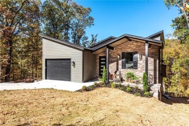 Discover luxury living in this brand new modern home, completed on Bella Vista Country Club and Golf Course in Arkansas - for sale on GolfHomes.com, golf home, golf lot