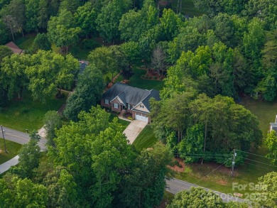 Step into this truly impeccably maintained Westport home and you on Westport Golf Club in North Carolina - for sale on GolfHomes.com, golf home, golf lot