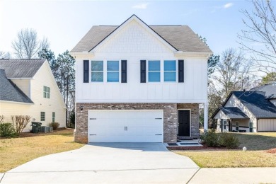 Welcome to this spacious 4-bedroom, 2.5-bath home in Covington on Indian Creek Golf Club in Georgia - for sale on GolfHomes.com, golf home, golf lot