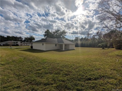 Look at this beautiful neighborhood! Large two-bedroom two bath on LakeSide Country Club in Florida - for sale on GolfHomes.com, golf home, golf lot
