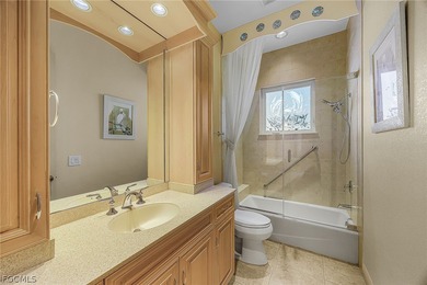 Experience refined living in this beautifully custom home on Royal Tee Country Club in Florida - for sale on GolfHomes.com, golf home, golf lot