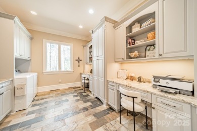 This exquisite custom home, designed by Elite Design Group & on Trump National Golf Club Charlotte in North Carolina - for sale on GolfHomes.com, golf home, golf lot