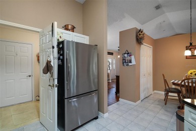 Welcome to this stunning home in a beautiful gated 55+ golf on Plantation Golf Club in Florida - for sale on GolfHomes.com, golf home, golf lot