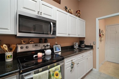 Welcome to this stunning home in a beautiful gated 55+ golf on Plantation Golf Club in Florida - for sale on GolfHomes.com, golf home, golf lot