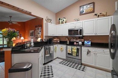 Welcome to this stunning home in a beautiful gated 55+ golf on Plantation Golf Club in Florida - for sale on GolfHomes.com, golf home, golf lot
